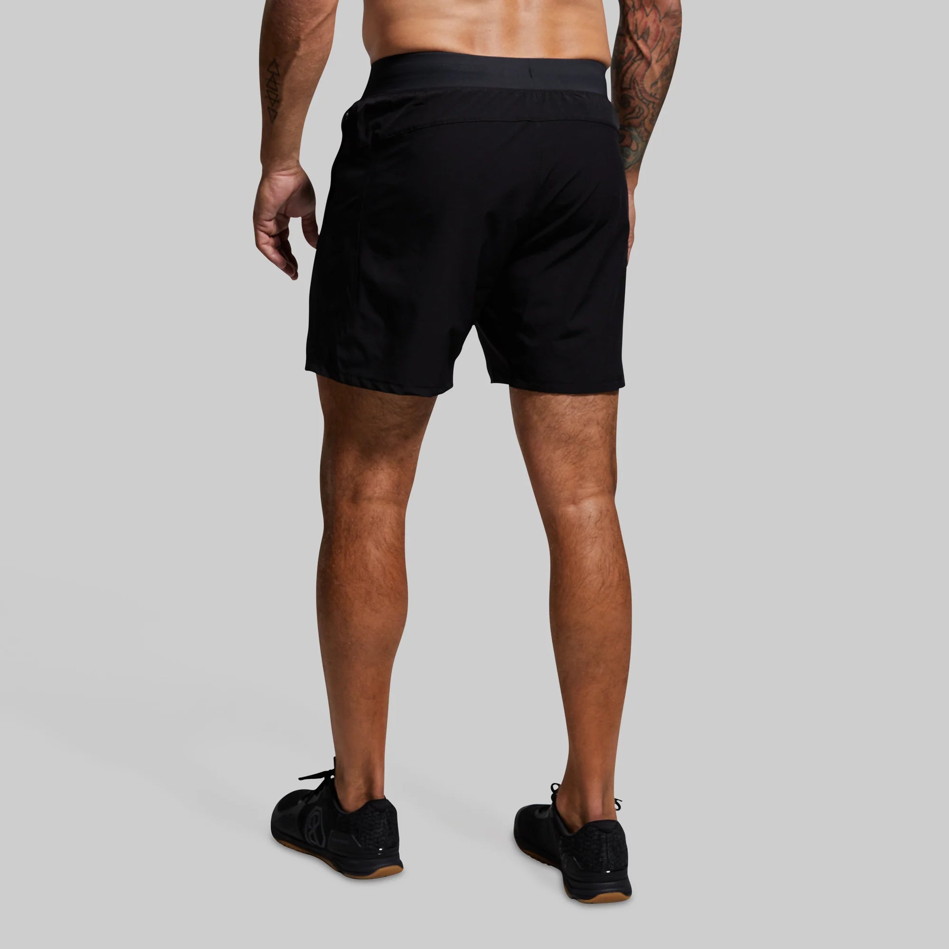 VERSATILE SHORT W/ COMPRESSION 7" - Black